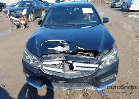 2014 Mercedes-Benz E 350 4Matic z USA, uszkodzony, nr VIN WDDHF8JB6EB062312